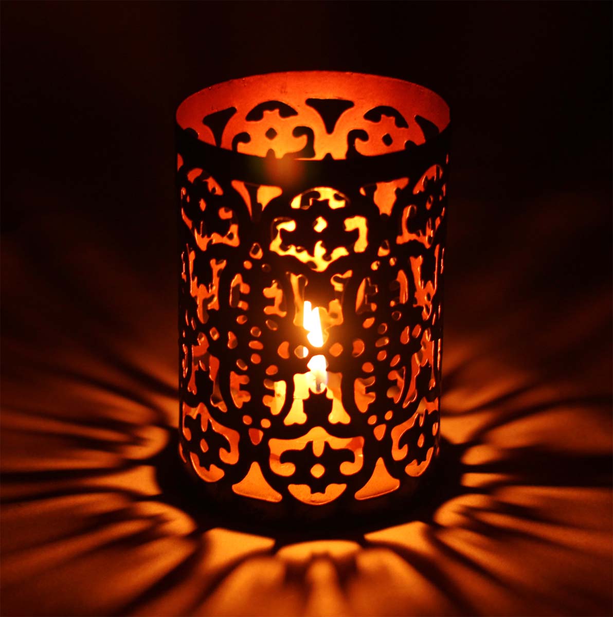 Handmade Round-Shaped Tea-Light Candle Holder in Iron - Black & Copper Color Finish - Symmetric Cut-Out Patterning - Metal Votive Candle Stands - Table-Top Decorations - Buy in Bulk Wholesale